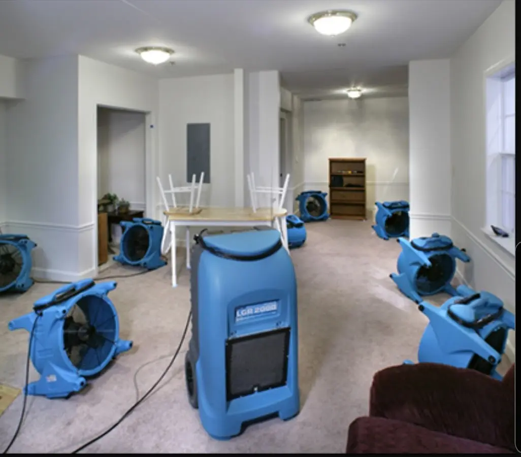 Air movers and dehumidifier setup for Water Damage Restoration in Mokena
